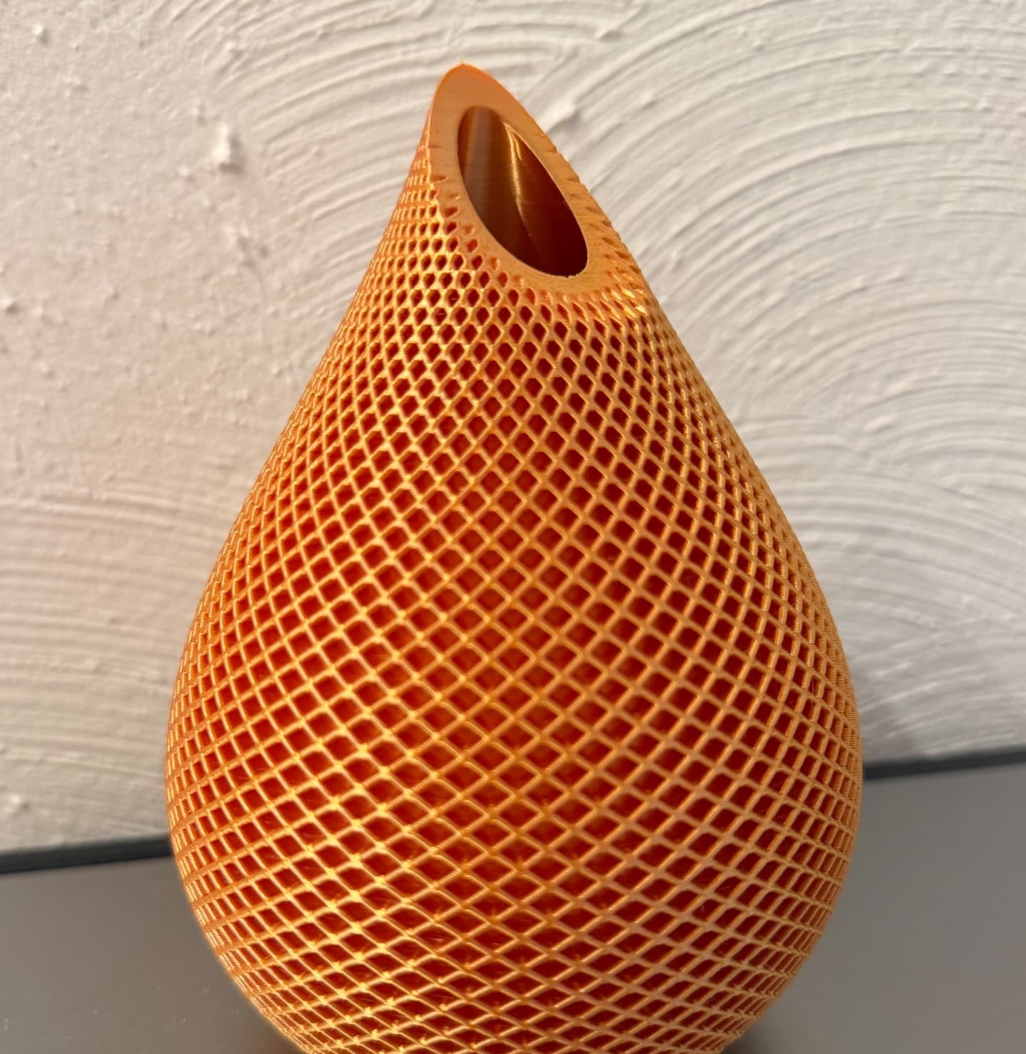 Lattice Vase — Golden lattice vase with an open diamond-weave shell