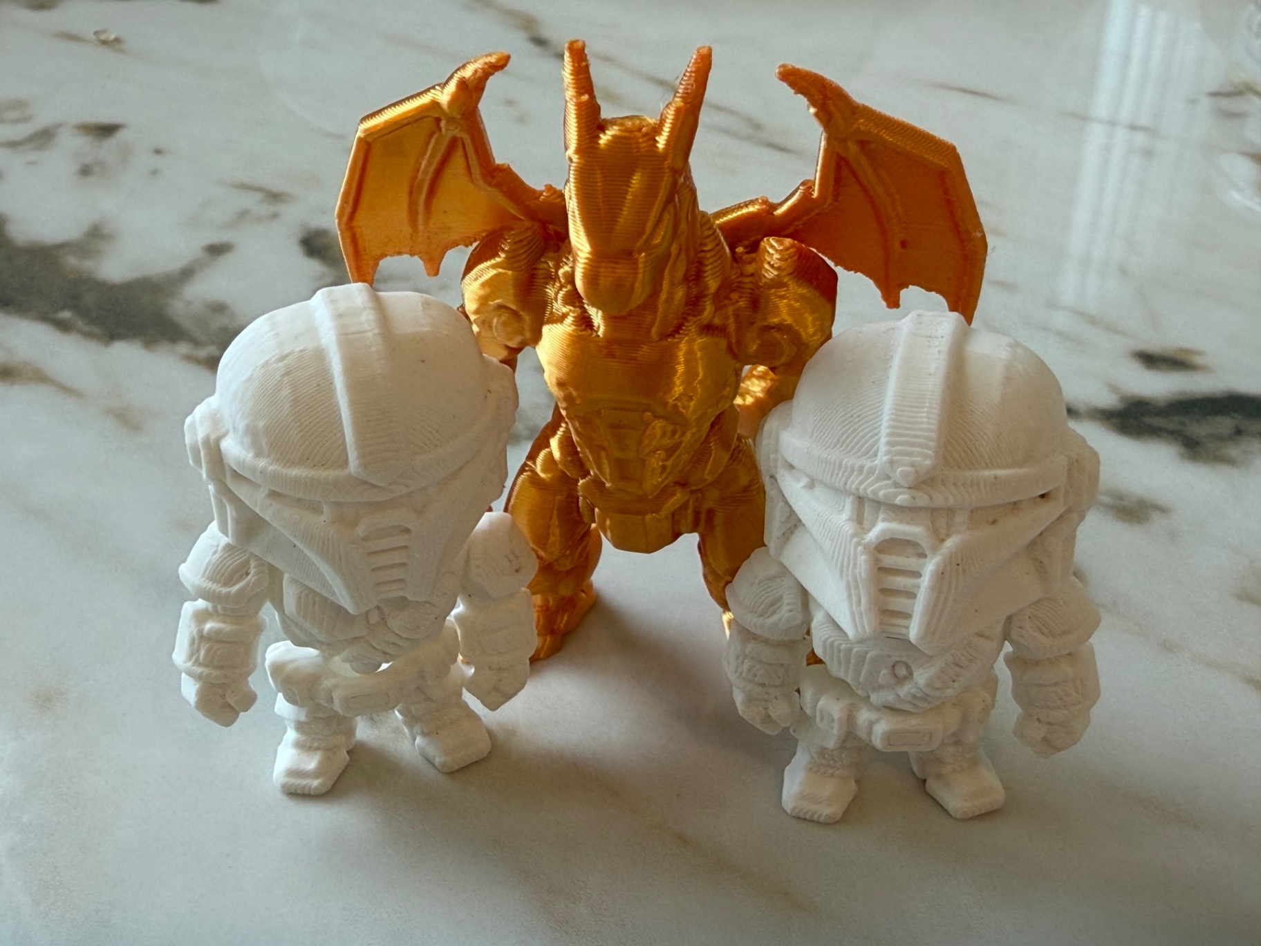 Dragon & Guards — Golden dragon flanked by two troopers