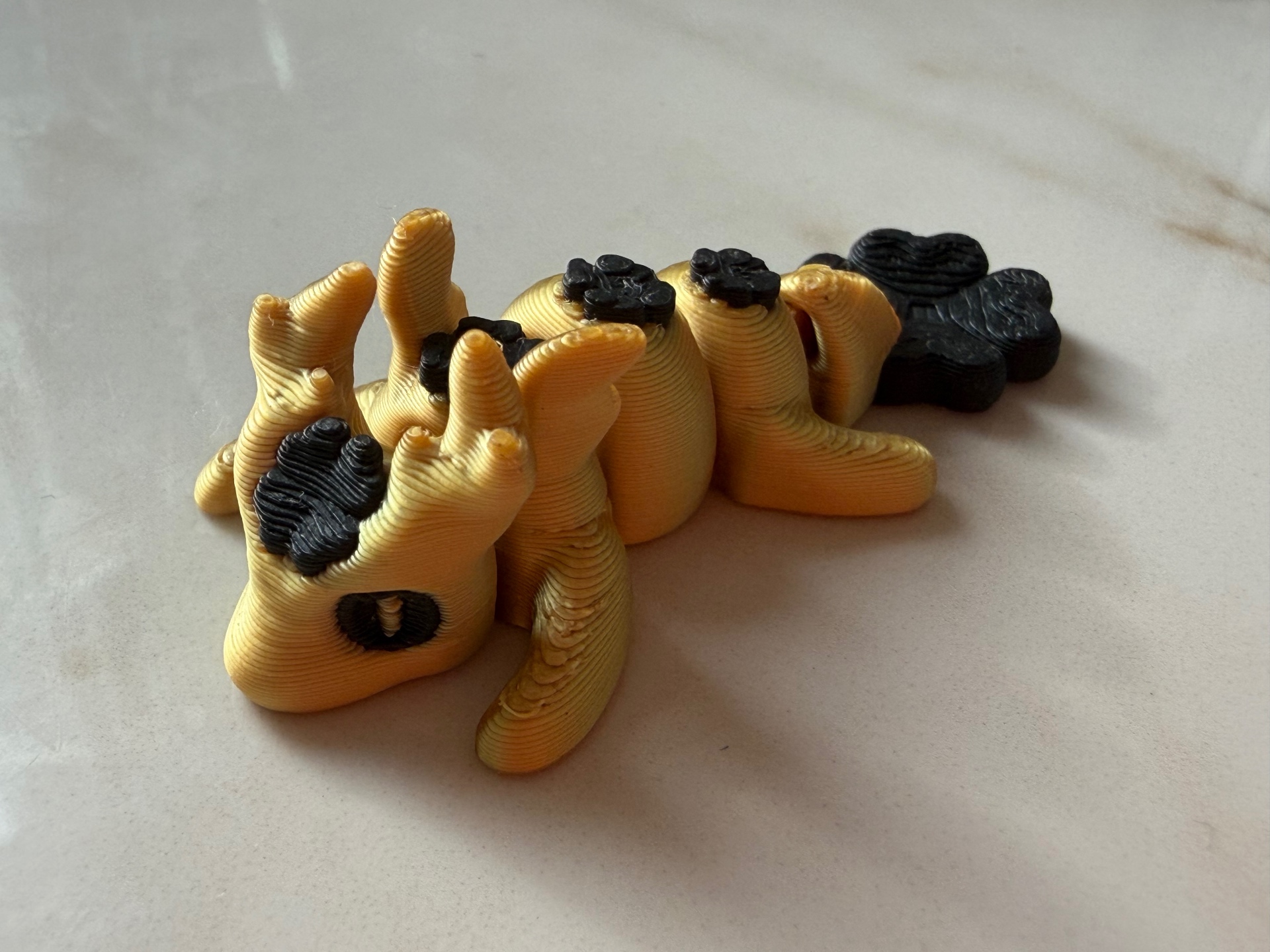 Sunny Fox — Golden nine-tail fox with black paw markings